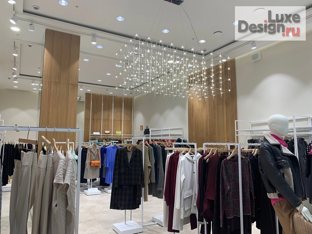 Дизайн интерьера бутика "Дизайн магазина одежды в ТЦ Авиапарк " (фото 8)