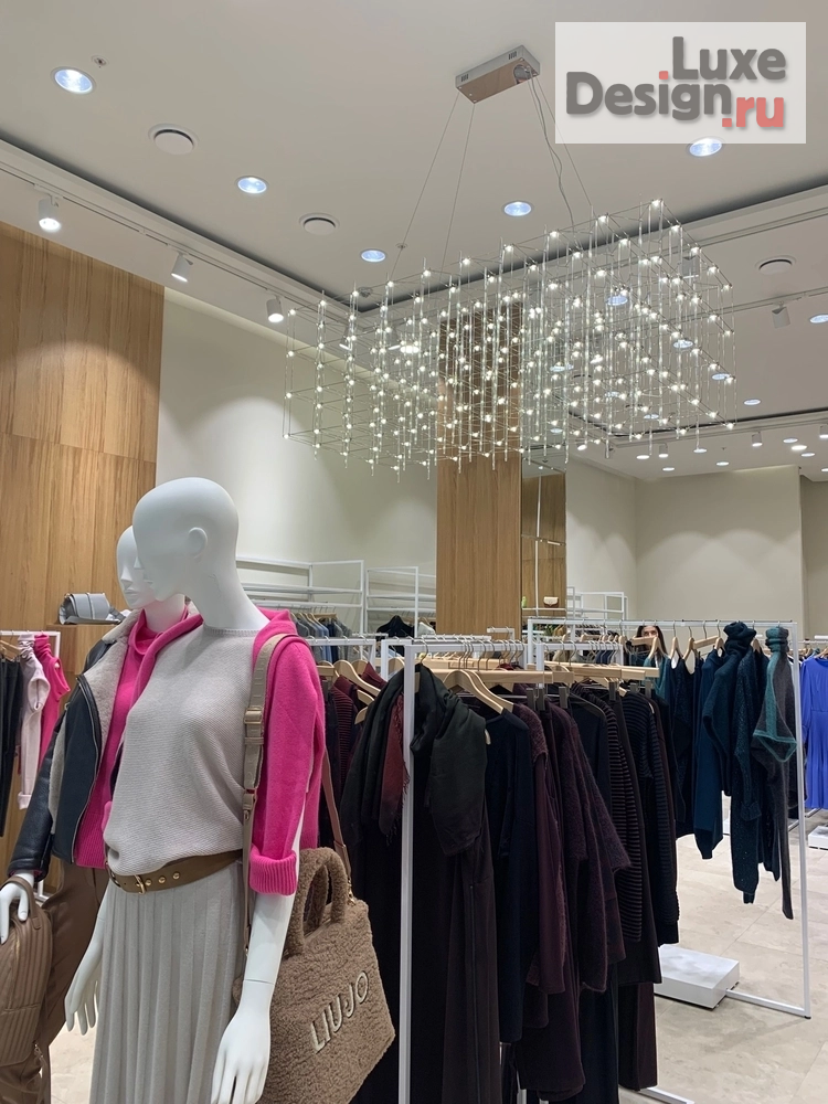 Дизайн интерьера бутика "Дизайн магазина одежды в ТЦ Авиапарк " (фото 11)