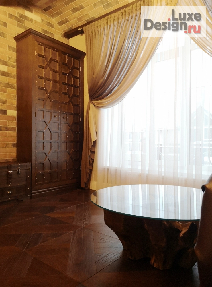 Дизайн интерьера коттеджа "Фото готового интерьера. Первый этаж загородного дома, гостевое пространство дома" (фото 30)